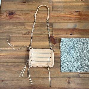 Rebecca minkoff side zipper nude bag.